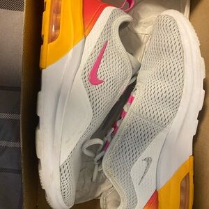 Nike Women's Gray and Pink Athletic Shoes with Orange Accents